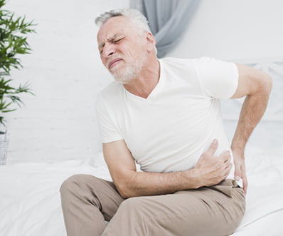elder man with back pain