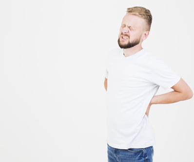 man suffering from backache
